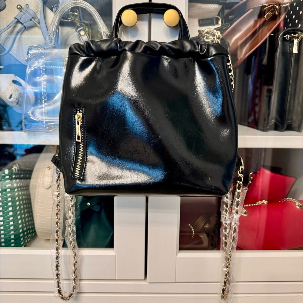 Brand new handbag/backpack with gold chain